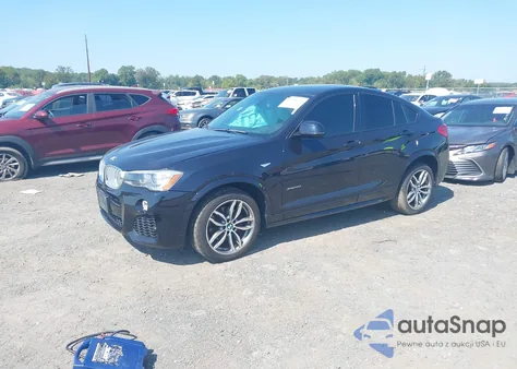 2015 BMW X4 xDrive35I z USA, uszkodzony, nr VIN 5UXXW5C56F0E87412